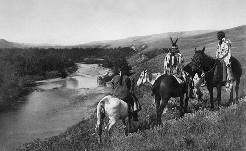 Indigenous people on horses