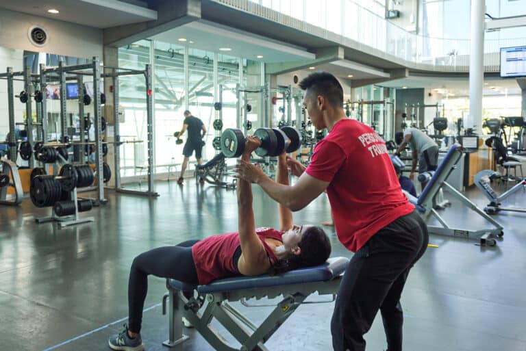The benefits of personal training with the RAWC Fitness consultant Hiro Zhou explains why students should consider individualized exercise programs. 